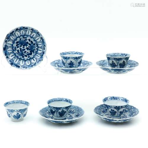 Five Blue and White Cups and Saucers