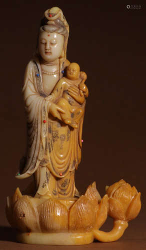 A TIANHUANG STONE CARVED GUANYIN SHAPE STATUE