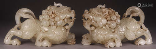 PAIR OF HETIAN JADE CARVED LION SHAPE PENDANTS