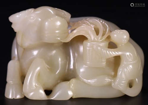 A HETIAN JADE CARVED CHILD BULL SHAPE PENDANT