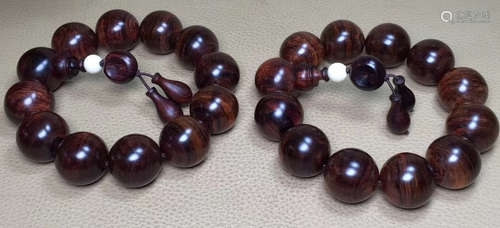 A HAINAN HUANGHUALI WOOD CARVED BRACELET