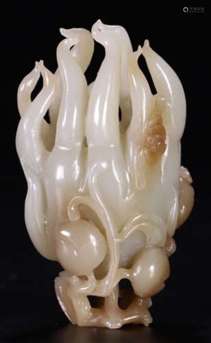 A HETIAN JADE CARVED CHAYOTE SHAPE PENDANT