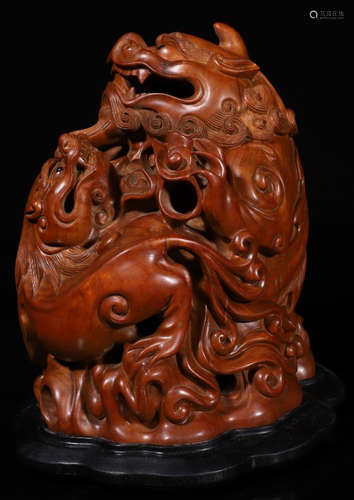 A HUANGYANG WOOD CARVED LION SHAPE CENSER