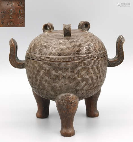 A BAMBOO CARVED CENSER WITH PATTERN