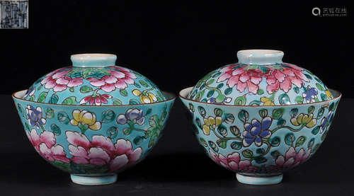 PAIR OF GREEN GLAZE FLOWER PATTERN BOWLS