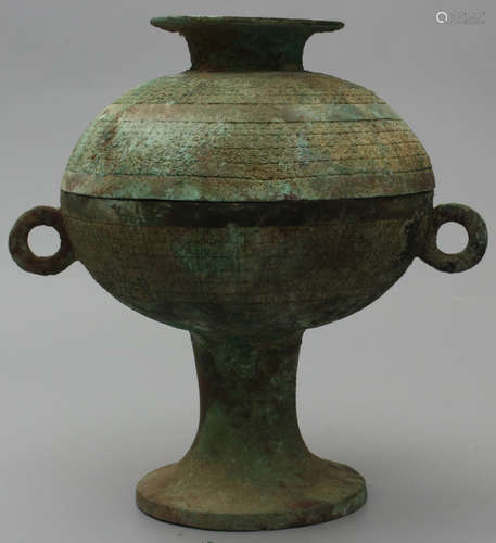 A BRONZE CASTED CONTAINER