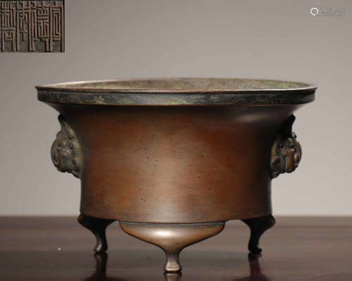 A COPPER CASTED TRIPOD CENSER