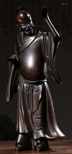 A COPPER CASTED FIGURE STATUE