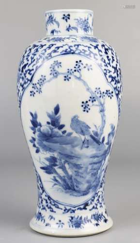 Blue and white vase with flower and bird patterns