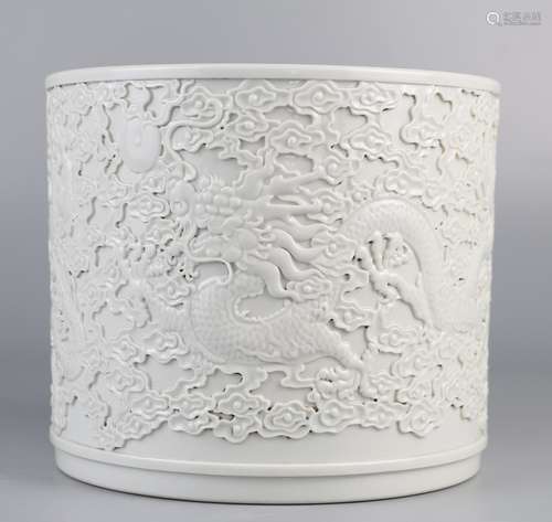 White glaze pen holder decorated with two dragons playing with beads