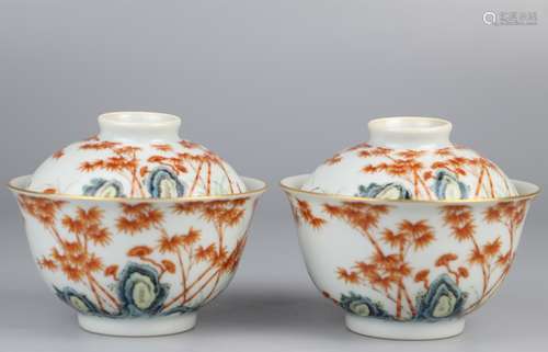 A pair of famille rose stone and bamboo covered bowls