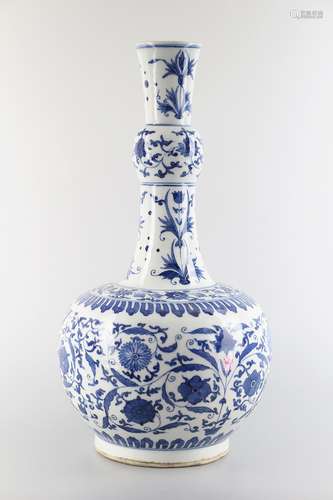 Garlic bottle decorated with blue and white flowers