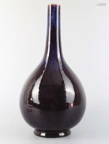 Long necked bottle with glaze