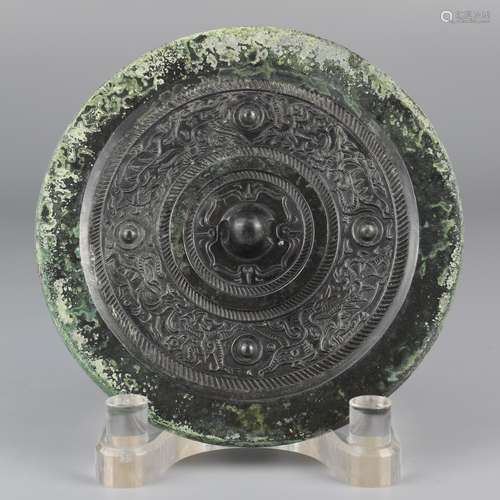 Bronze mirror with auspicious animal pattern