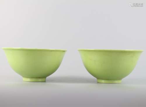 A pair of green glazed apple tea bowls