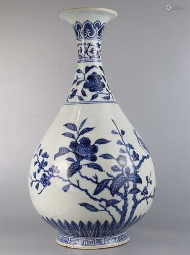 Spring vase with blue and white flowers