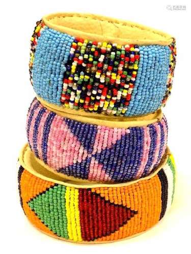 GROUP OF 3 ARTISAN MADE AFRICAN BANGLE BRACELETS