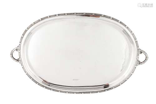 A George V sterling silver ‘arts and crafts’ twin handled tray, Birmingham 1923 by A. E. Jones