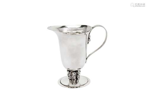 A George V sterling silver cream or milk jug, London 1930 by Charles Boyton
