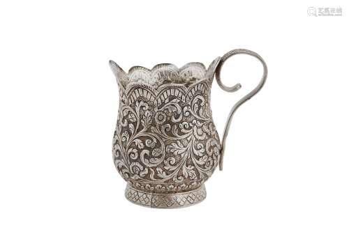 A late 19th century Anglo – Indian Raj unmarked silver cream jug, Kutch circa 1880-1900