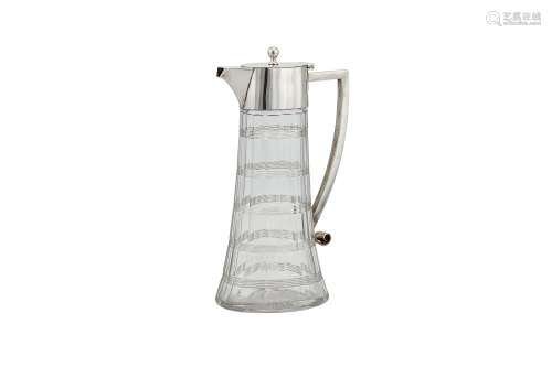 A Victorian sterling silver mounted glass claret jug, London 1900 by William Hutton and Sons