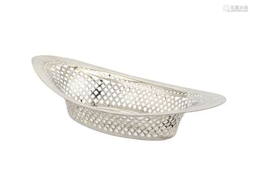 A George V sterling silver breadbasket, London 1911 by Stewart Dawson & Co Ltd