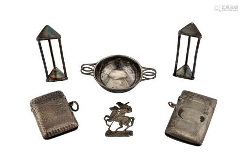 A mixed group of silver items including a pair of George III silver knife rests, London 1797 by