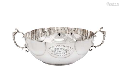 Agricultural interest – A Victorian sterling silver twin handled trophy bowl, London 1894 by Edwin