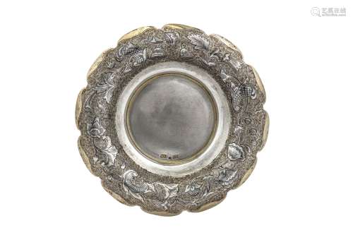 An Alexander II Russian provincial parcel gilt and niello 84 zolotnik (875 standard) silver saucer,