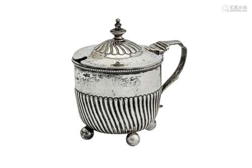 A Victorian sterling silver mustard pot, Birmingham 1882 by Horace Woodward & Co