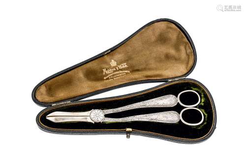 A cased pair of Victorian sterling silver grape scissors, Sheffield 1893 by Mappin and Webb