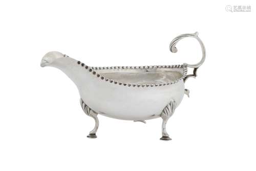 A George III sterling silver sauce or cream boat, London 1788 by Hester Bateman overstruck by