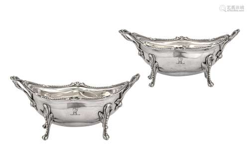 A pair of George III sterling silver open sauce tureens, London 1770 by William Holmes (active from