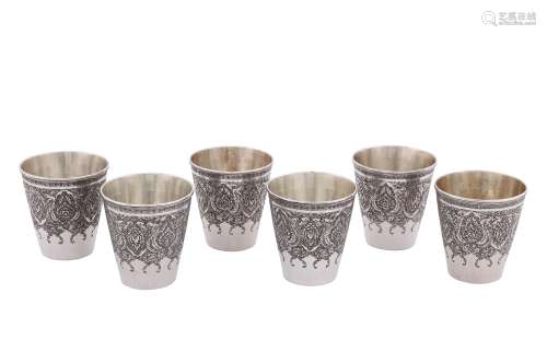 A set of six mid-20th century Iranian (Persian) silver beakers, Isfahan circa 1950 mark of Hussain