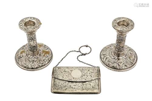 A pair of Elizabeth II sterling silver dwarf candlesticks, Birmingham 1961 by W I Broadway & Co