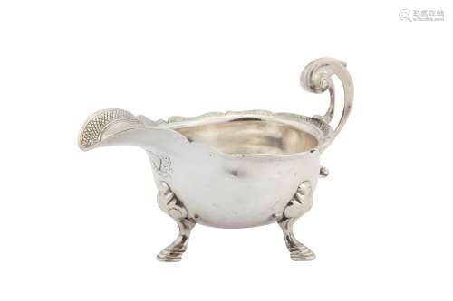 A George II sterling silver cream boat, London 1734 maker mark partially obscured but certainly for