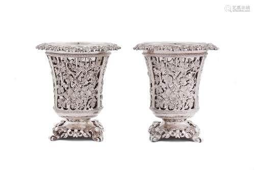 A pair of late 19th / early 20th century Ottoman Turkish 900 standard silver spoon warmers, with