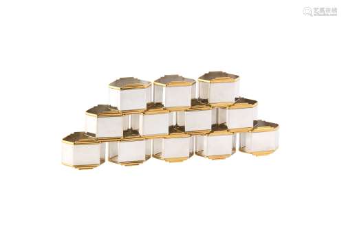 A set of twelve modern German sterling silver parcel gilt napkin rings, circa 1990 by Robbe &