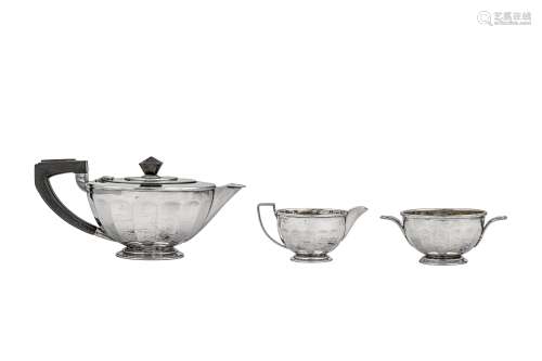 A George V Art Deco sterling silver three-piece tea service, Birmingham 1934 by Goldsmiths and