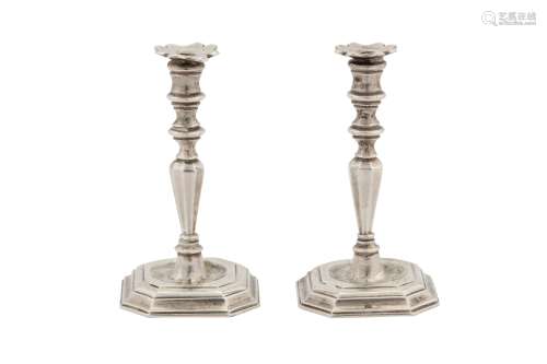 A pair of mid-18th century Dutch silver miniature ‘toy’ cast candlesticks, Amsterdam 1758 by