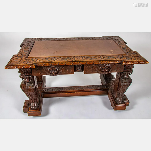 A Regency Style Carved Oak Library Table, 20th Century.