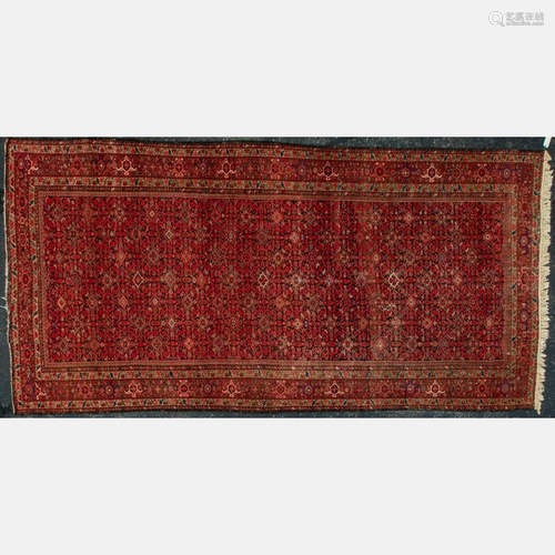 A Bokhara Wool Rug, 20th Century.