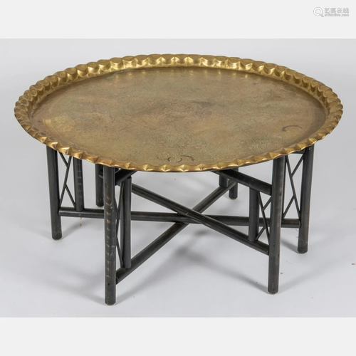 A Persian Hammered Brass Table Top on Wood Sta…