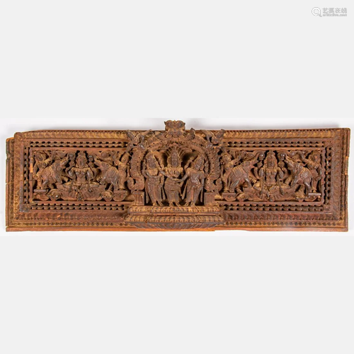 An Indian Carved Wood Temple Fragment, Depicting