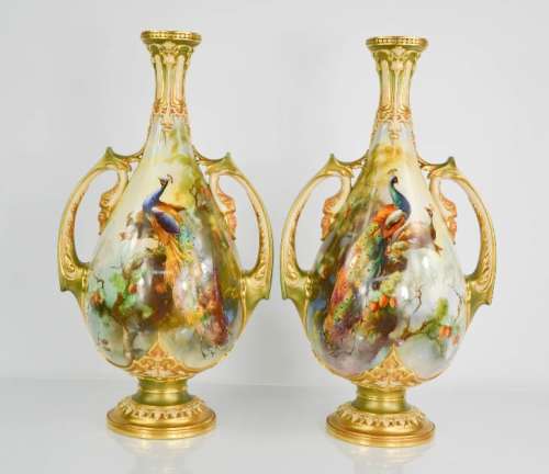 A Royal Worcester pair of vases signed by William Powell, hand painted with peacocks and peahens