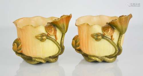 A pair of Royal Worcester Japanesque vases, modelled with lily, frog and turtle. 11cms