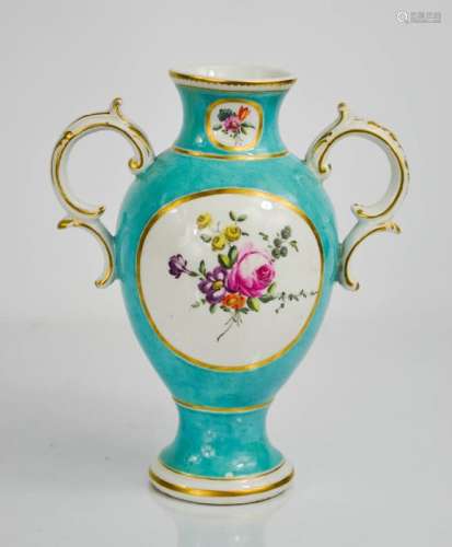 An 18th century Chelsea Derby turquoise vase, with painted floral panels, circa 1775. 18cms
