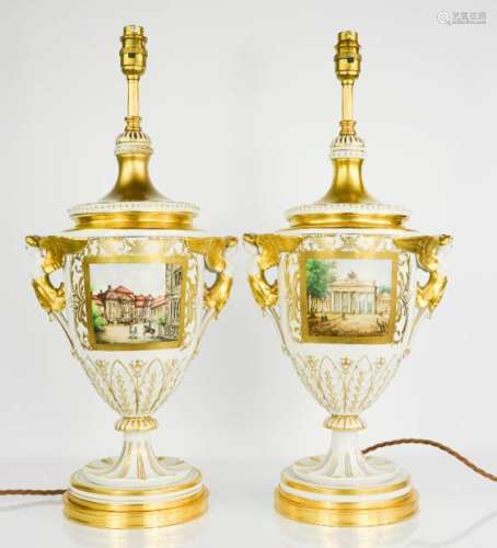 A pair of French late 19th / early 20th century vases, converted to electric, modelled with satyr