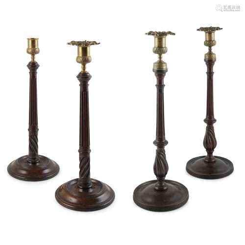 TWO PAIRS OF GEORGE III MAHOGANY AND BRASS CANDLESTICKS LATE 18TH CENTURY