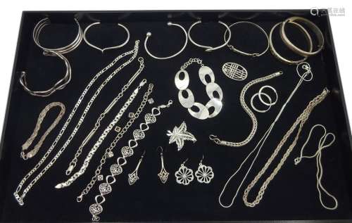 Collection of silver jewellery including bracelets, earrings, bangles, necklaces and brooch, all sta